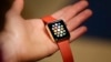 A woman holds the Apple Watch Edition during a demo following an Apple event Monday, March 9, 2015.