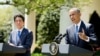 美国总统奥巴马和日本首相安倍晋三4月28日在白宫联合记者会上。