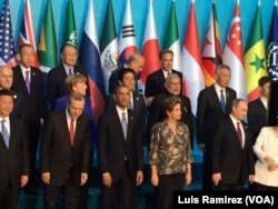 U.S. President Barack Obama, front center, joins other Group of 20 world leaders for a group photo in Antalya, Turkey, Nov. 15, 2015.