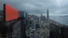 資料照片：一塊位於香港商業區的紅色廣告屏。 （2021年7月19日）