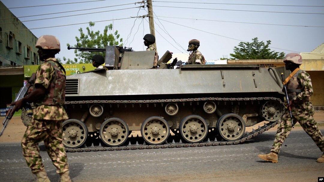 Nigerian troops patrol in the northeastern Nigeria city of Mubi — recaptured from Boko Haram in February — 20 kilometers (14 miles) west of the Cameroon border, March 9, 2015.