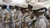 FILE - Saudi troops stand at attention at their base in Yemen's southern port city of Aden, Sept. 28, 2015.
