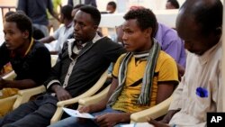 FILE - Ethiopian migrants gather at the International Organization for Migration center in the port city of Aden, Yemen, Jan. 2, 2017.