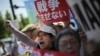 日本内阁通过新安保法相关法案