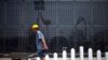 China Economic Growth Hits 6-Year Low