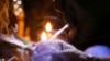  A drug user inhales "shabu," or methamphetamine, at a drug den in Manila, Philippines, Feb. 13, 2017.