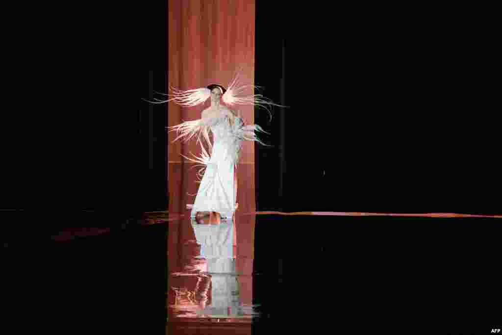 Canadian super model Coco Rocha presents a creation for Stephane Rolland during the Women's Haute-Couture Spring/Summer 2025 Fashion Week in Paris.
