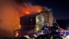 Firefighters work to extinguish a fire at a hotel in the ski resort of Kartalkaya in Bolu, Turkey, Jan. 21, 2025. (Ihlas News Agency (IHA) via Reuters) 
