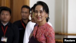 Myanmar's National League for Democracy leader Aung San Suu Kyi arrives to the opening of the new parliament in Naypyitaw February 1, 2016. After decades of struggle, hundreds of lawmakers from Aung San Suu Kyi's camp will form Myanmar's ruling party on M