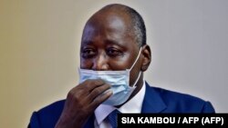 Amadou Gon Coulibaly, Ministre wa yambo ya Côte d'Ivoire, na bozongi na ye kowuta France, na libanda lya mpepo ya Abidjan, 2 juillet 2020.