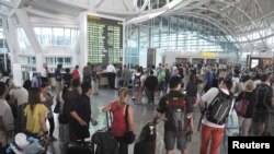 Suasana di bandara internasional Ngurah Rai, Bali, 10 Juli 2015. (Foto: dok). 