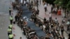 Pro-Democracy Protesters Stage 'Black Cloth' March in Hong Kong