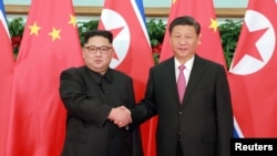 金正恩與習近平2018年5月在大連會面（路透社轉載朝鮮中央社照片）