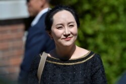 孟晚舟离开位于温哥华住所前往法院(2020年5月27日)