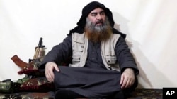 Pemimpin ISIS, Abu Bakar Al Baghdadi dalam video yang dirilis Senin (29/4). 