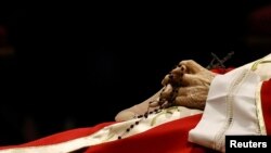 Faithful pay homage to former Pope Benedict in St. Peter's Basilica at the Vatican
