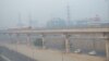 FILE - As pollution levels spike, Delhi and its satellite towns are enveloped in a haze of smog on Oct. 30, 2018. 