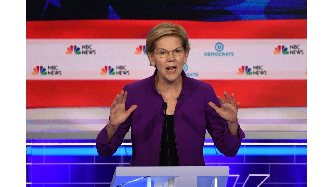 FILE - Democratic presidential hopeful Massachusetts Senator Elizabeth Warren participates in the first Democratic primary debate of the 2020 presidential campaign at the Adrienne Arsht Center for the Performing Arts in Miami, June 26, 2019.