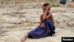 Dečak, pripadnik etničke grupe Rohidnža muslimana, u iBangladešu