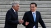 Sri Lanka's Prime Minister Ranil Wickremesinghe, (l) chats with Chinese Premier Li Keqiang during a welcome ceremony outside the Great Hall of the People in Beijing, April 7, 2016.