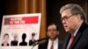 Attorney General William Barr announces that members of the Chinese military have been charged with hacking the computer networks of U.S. credit rating giant Equifax, Feb. 10, 2020, at the Justice Department in Washington.