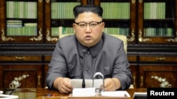 North Korea's leader Kim Jong Un makes a statement regarding U.S. President Donald Trump's speech at the U.N. general assembly, in this undated photo released by North Korea's Korean Central News Agency in Pyongyang, Sept. 22, 2017.