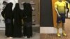 FILE - Saudi women shop at a mall in Riyadh, Saudi Arabia, Dec. 11, 2015. 