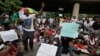 People attend demonstration calling on government officials to rescue schoolgirls kidnapped from a government secondary school, Lagos, May 1, 2014.