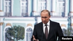 FILE - Russian President Vladimir Putin speaks during a session of the St. Petersburg International Economic Forum 2015, St. Petersburg, Russia, June 19, 2015.