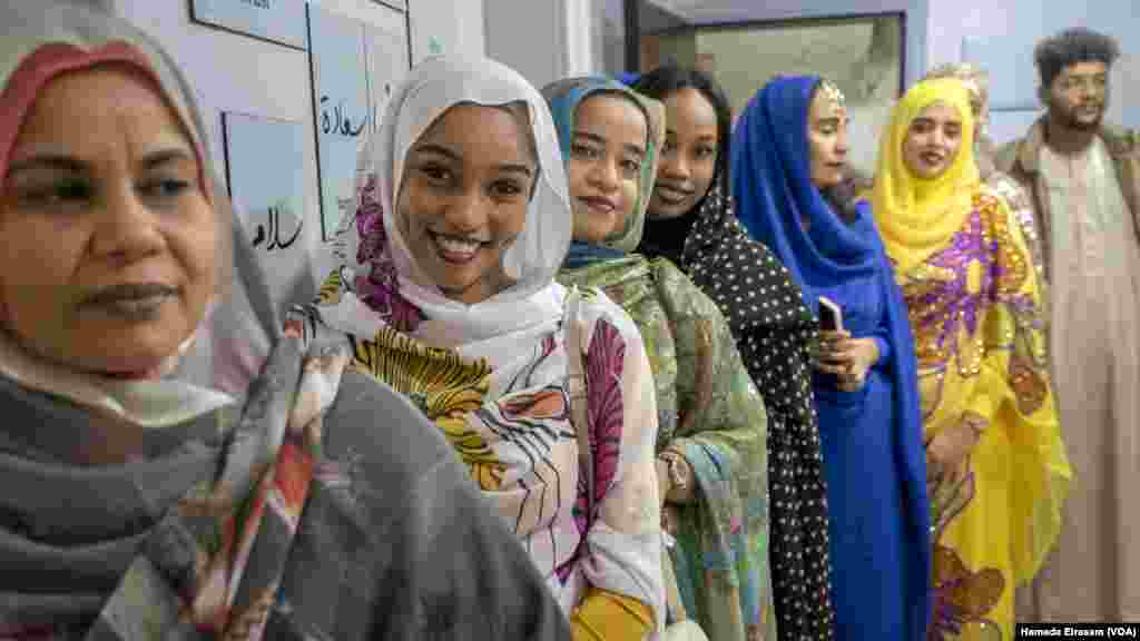 Sudanese women brighten up the law office’s opening party in Cairo on Nov. 11, 2024, with their traditional thobes, or gowns, known as a “unifying national dress” and deep-rooted form of cultural expression across Sudan and South Sudan.