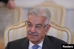FILE - Pakistan's then-Minister for Foreign Affairs Khawaja Asif attends a meeting in Moscow, Feb. 20, 2018.