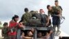 Rebels of the Revolutionary Armed Forces of Colombia, FARC, arrive in Yari Plains, southern Colombia, Sept. 25, 2016. 