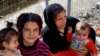 Syrian, Iraqi Refugees in Greece: We Won't Go Back
