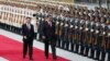 Presiden China Xi Jinping berjalan mendampingi Presiden Venezuela Nicolas Madura dalam upacara penyambutan kunjungan di Beijing, China, 14 September 2018.