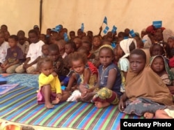 Children escaped from the Central African Republic civil war study at Gado Badzere refugee camp in Cameroon. (Photo by Eugene Nforngwa)