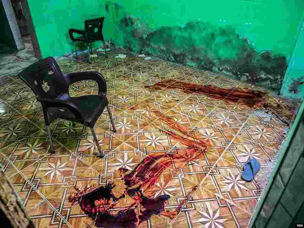 Ramy M. Abdul, a forensic doctor who worked for the Egyptian Ministry of Health when the men died, also says the crime scene does not support the government’s assertion that the men were killed during a fight. “It seems that both of the bodies have been shot in the back,” he says. Additionally he says the position of the guns in the two published photos are different, pointing to the possibility of planted evidence. (H. Elrasam/VOA) May, 2015 in Giza, Egypt.