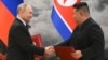 Vladimir Putin i Kim Džong Un posle potpisivanja sporazuma u Pjongjangu
(Photo by Kristina Kormilitsyna / POOL / AFP) 