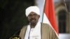 FILE - Sudanese President Omar al-Bashir delivers a speech to the nation, Feb. 22, 2019, at the presidential palace in the capital Khartoum.