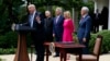 Presiden Donald Trump menyampaikan pidatonya di Rose Garden (Taman Mawar) Gedung Putih, Washington, sebelum penandatanganan inpres yang bertujuan untuk mengurangi peraturan IRS yang membatasi aktivitas politik untuk gereja-gereja, 4 Mei 2017. Didampingi oleh (dua dari kiri ke kanan:) Kardinal Donald Wuerl, Uskup Agung Washington, Pastor Jack Graham, Paula White, pastur senior New Destiny Christian Center di Apopka, Florida dan Wapres Mike Pence. (AP Photo/Evan Vucci)