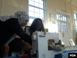 Suhad el Marsomi, an Iraqi refugee, teaches sewing while she awaits a decision on her asylum application, October 12, 2016. “Even if (it is for) free, it’s not a problem for me," she said. "Just I want to feel I’m human. I’m still human. I’m still in the life.”