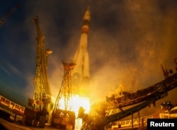 The Soyuz MS-11 spacecraft carrying the crew formed of David Saint-Jacques of Canada, Oleg Kononenko of Russia and Anne McClain of the U.S. blasts off to the International Space Station, Kazakhstan Dec. 3, 2018.