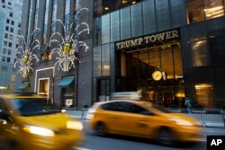 Traffic passes Trump Tower in New York, Nov. 21, 2016.