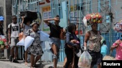 Gangues fazem muita gente abandonar as suas casas, Port-au-Prince