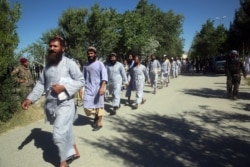 Prisoners are released from Bagram Prison in Parwan province, Afghanistan, May 26, 2020.