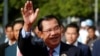 FILE - President of the ruling Cambodian People's Party and Prime Minister Hun Sen attends a ceremony to mark the 68th anniversary of the establishment of the party in Phnom Penh, Cambodia, June 28, 2019. 