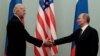 RUSSIA -- Russian Prime Minister Vladimir Putin shakes hands with U.S. Vice President Joe Biden during their meeting in Moscow, March 10, 2011.