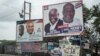 FILE - The campaign billboards of Ghana's two main political parties running in this year's national election are shown in the streets of Accra in Ghana, Oct. 8, 2016.