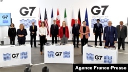 G-7 Foreign and Development Ministers pose for a group photograph during the final day of the G-7 summit in Liverpool, northwest England, Dec. 12, 2021.