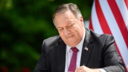 US Secretary of State Mike Pompeo signs an agreement on fifth-generation internet technology with Slovenia's Foreign Minister Anze Logar in Bled, Slovenia, Aug. 13, 2020.