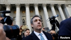 FILE - U.S. President Donald Trump's former lawyer Michael Cohen exits Federal Court after entering a guilty plea in Manhattan, New York City, U.S., November 29, 2018. 